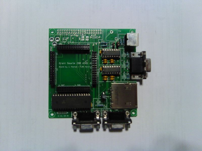 File:Interface PCB with almost all of the needed parts.jpeg